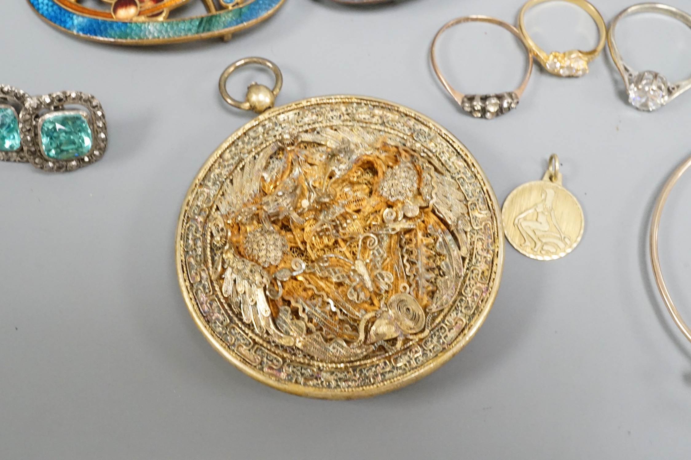 A quantity of mainly costume jewellery and other items including enamelled belt buckle.